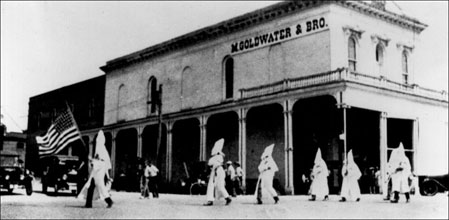 Klan members march in front of M. Goldwater store, Prescott 1928